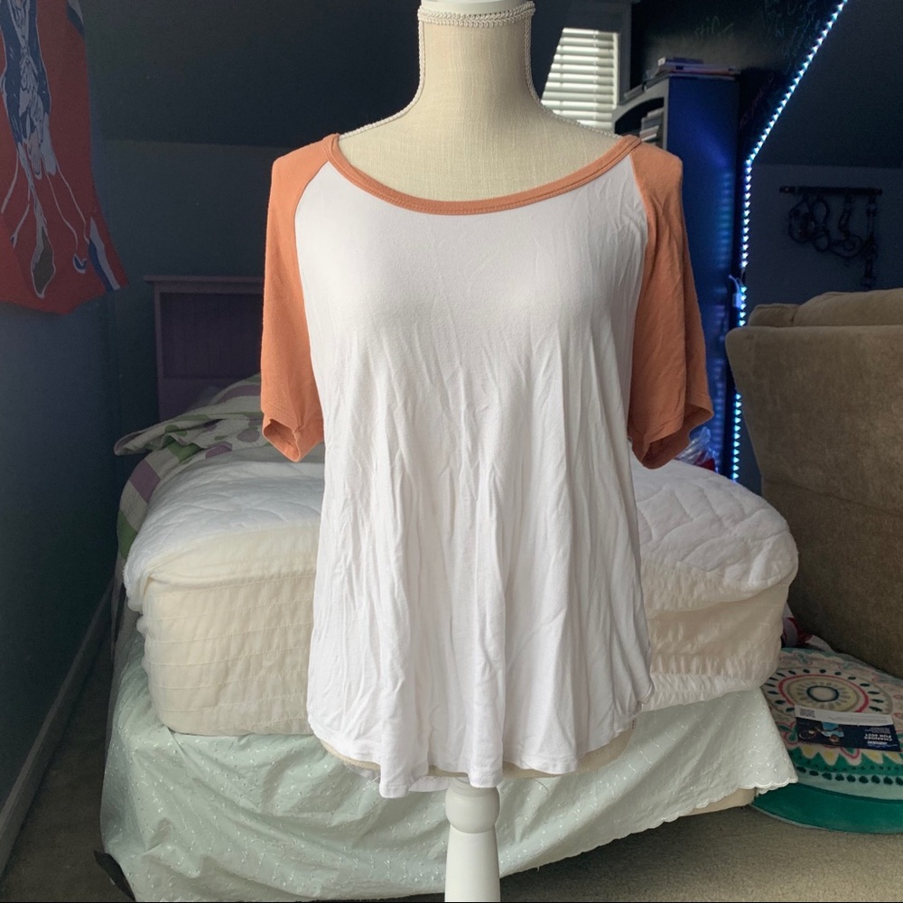 white and orange baseball tee